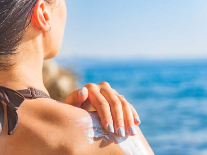 applying enough sun cream