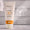 Tub de crema solar sin perfume SPF30 de Green People junto a un sello "Dermatológicamente Comprobado".