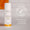 Loción autobronceadora Green People de 150 ml sobre azulejos blancos de baño, con sello "Dermatológicamente Comprobado".