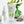Eine Tube Organic Children Aloe Vera Lotion & After Sun steht aufrecht neben einer Holzspielzeugmaus und einer grünen Vase